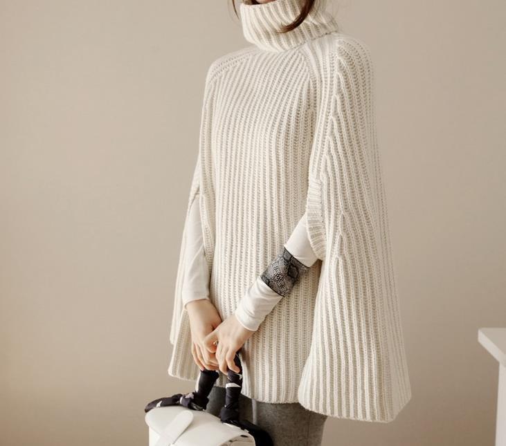Damen Strickponcho mit hochstehendem Kragen und modischem Rippenmuster EB