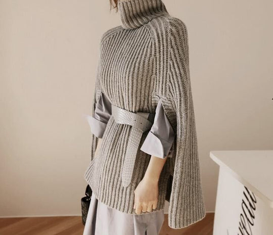 Damen Strickpullover mit hohem Kragen und asymmetrischem Schnitt EB