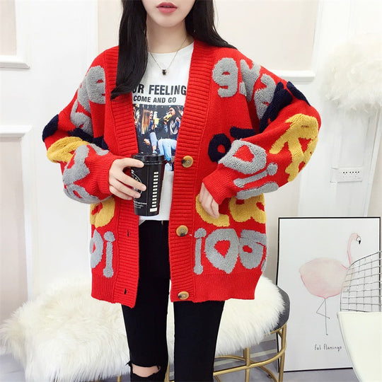 Damen Strickjacke mit buntem Design und großen Knöpfen EB