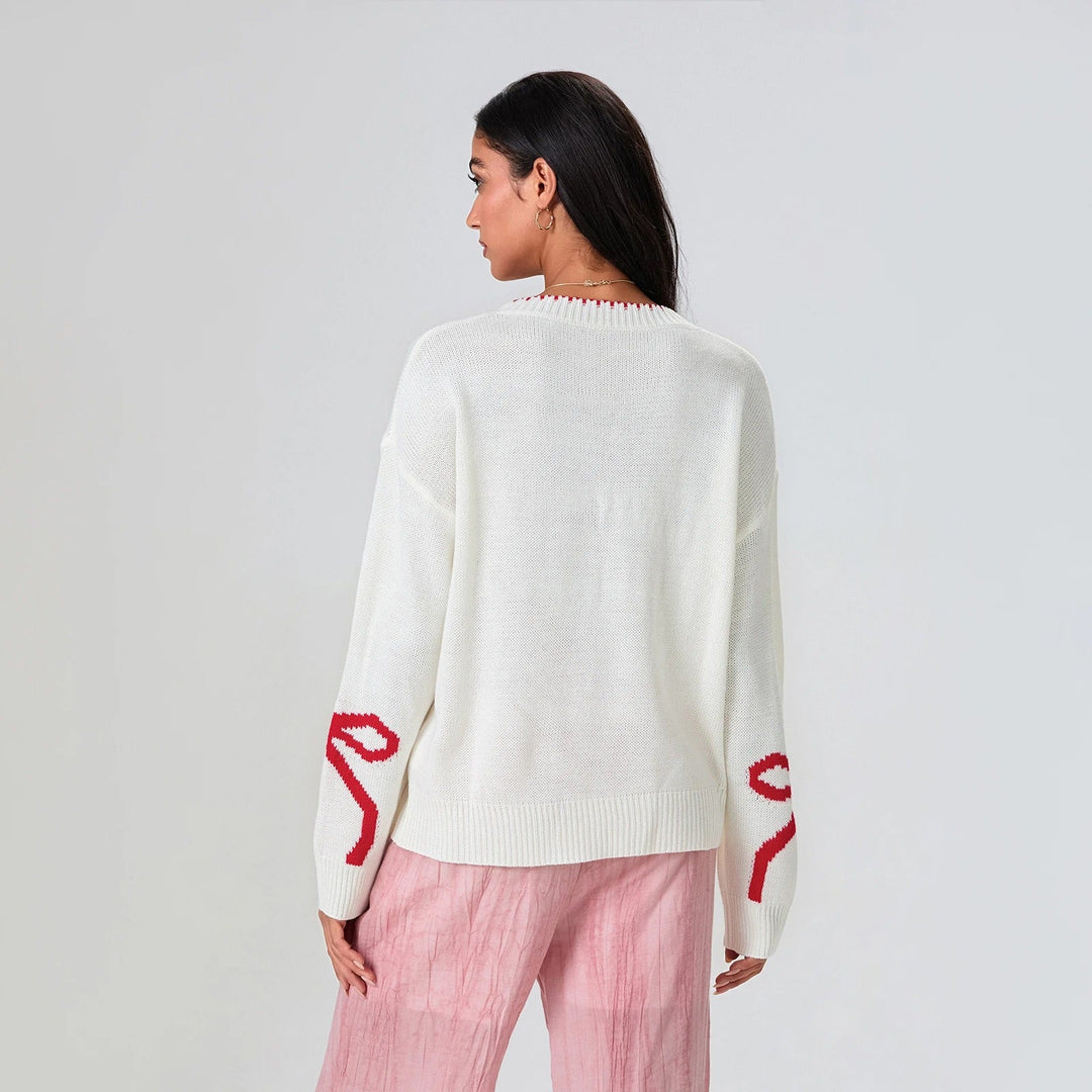 EB | Festlicher Strickpullover mit Schleifen-Design