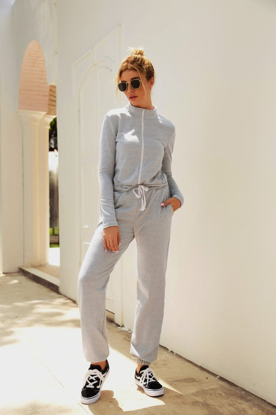 Damen Kapuzenoverall aus bequemem Sweatstoff mit elastischen Bündchen und taillierbarem Kordelzug EB