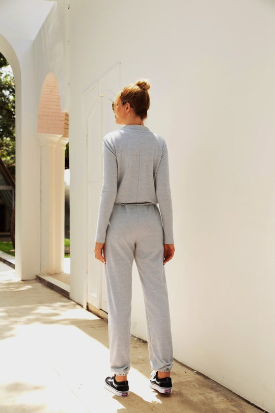 Damen Kapuzenoverall aus bequemem Sweatstoff mit elastischen Bündchen und taillierbarem Kordelzug EB