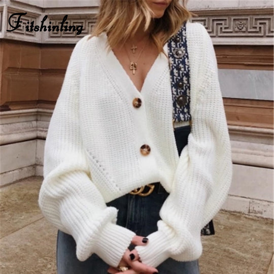 Damen Strickjacke mit oversized Schnitt und dekorativen Knopfdetails EB