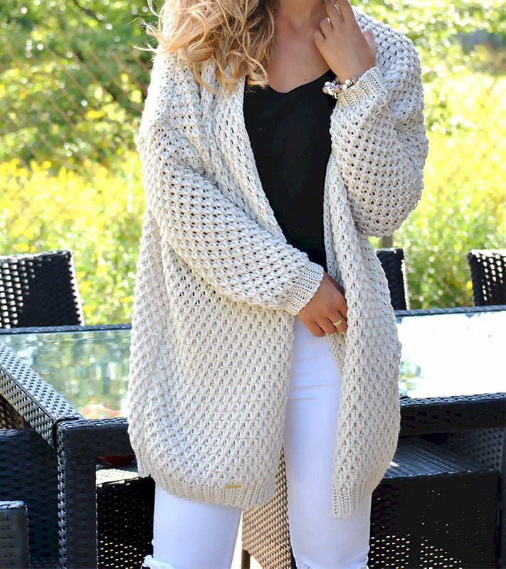 Damen Grobstrickjacke mit modischer Lochstruktur und lässigem Schnitt EB