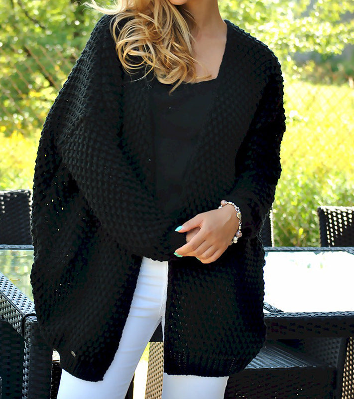Damen Grobstrickjacke mit modischer Lochstruktur und lässigem Schnitt EB