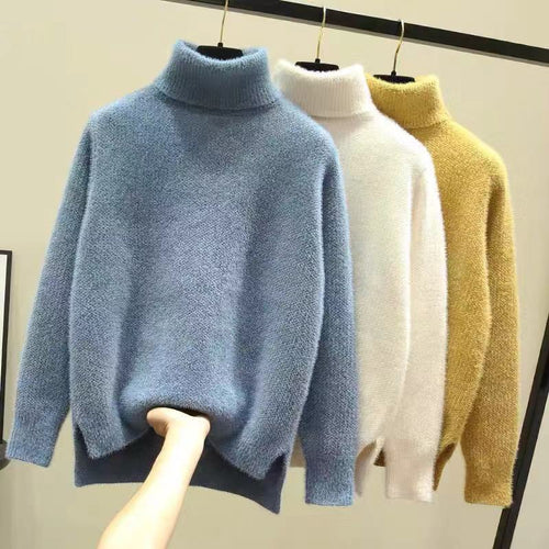 Damen Oversized Rollkragenpullover aus weichem Strick EB