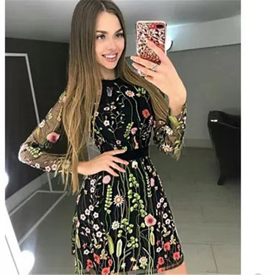 Damen Blumenmuster Kleid mit transparenten Ärmeln und Taillengürtel EB