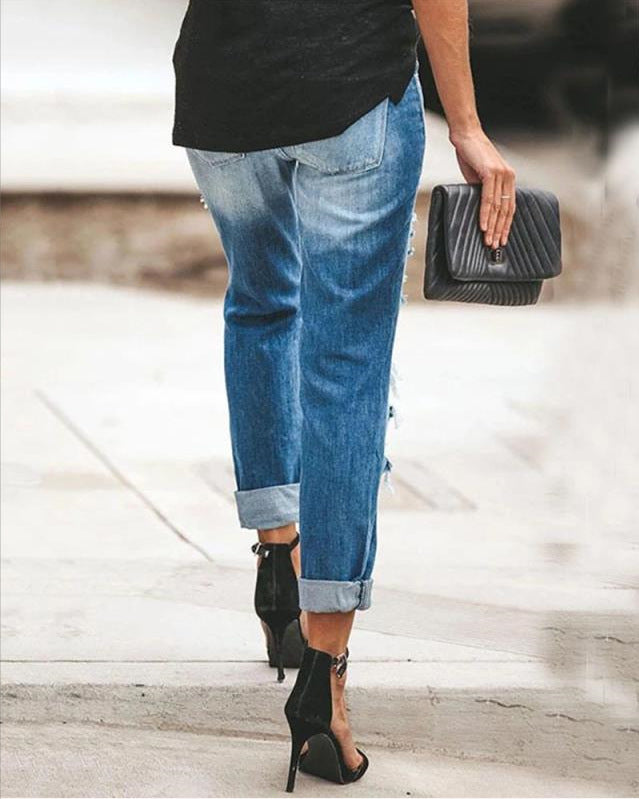Damen Ripped Jeans im modernen Slim-Fit Schnitt mit fransigen Details EB