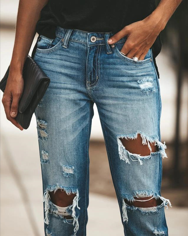 Damen Ripped Jeans im modernen Slim-Fit Schnitt mit fransigen Details EB