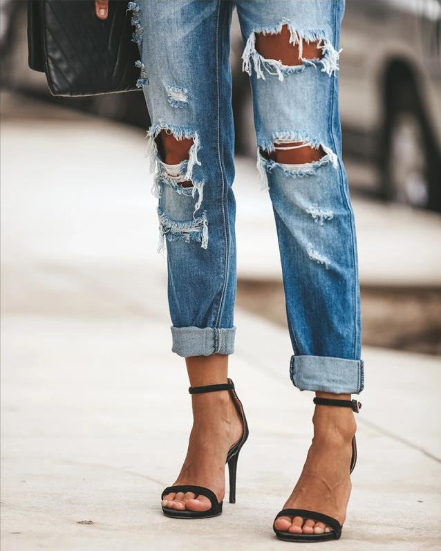 Damen Ripped Jeans im modernen Slim-Fit Schnitt mit fransigen Details EB