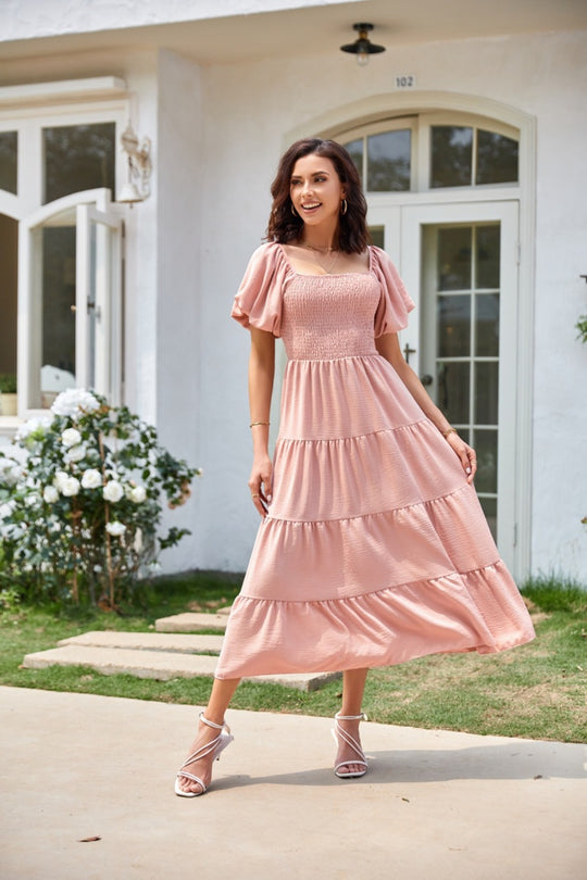 EB | Plissee-Kleid mit quadratischem Ausschnitt und Neckholder-Blasenärmeln