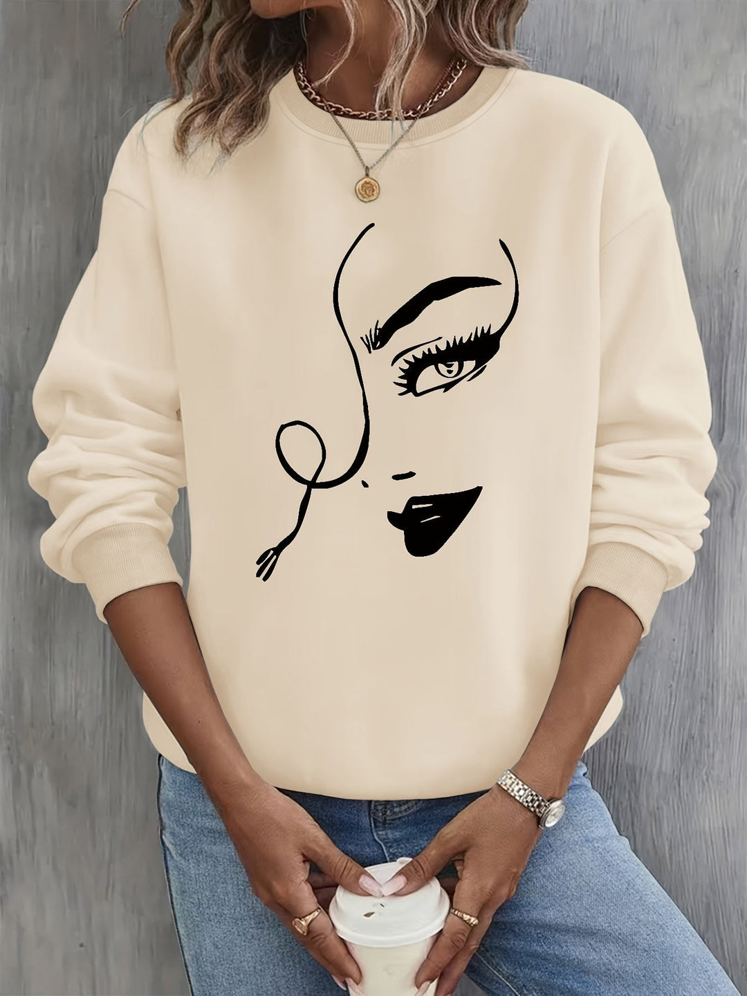 EB | Sweatshirt mit Künstlerischem Gesicht Baumwolle Trendy und Bequem