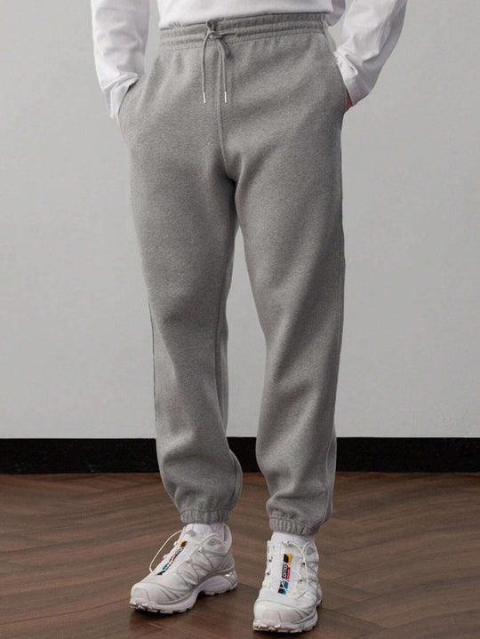 EB | Unifarbener Kapuzenpulli und Hose für Herren