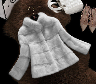 Damen Kunstpelzjacke mit modernem Schnitt und hohem Kragen EB