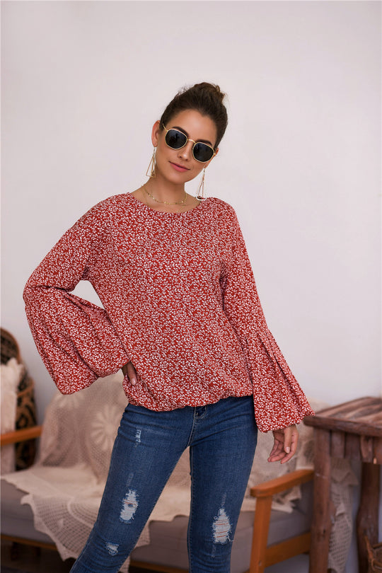 Damen Bluse mit voluminösen Ärmeln und floralen Details EB
