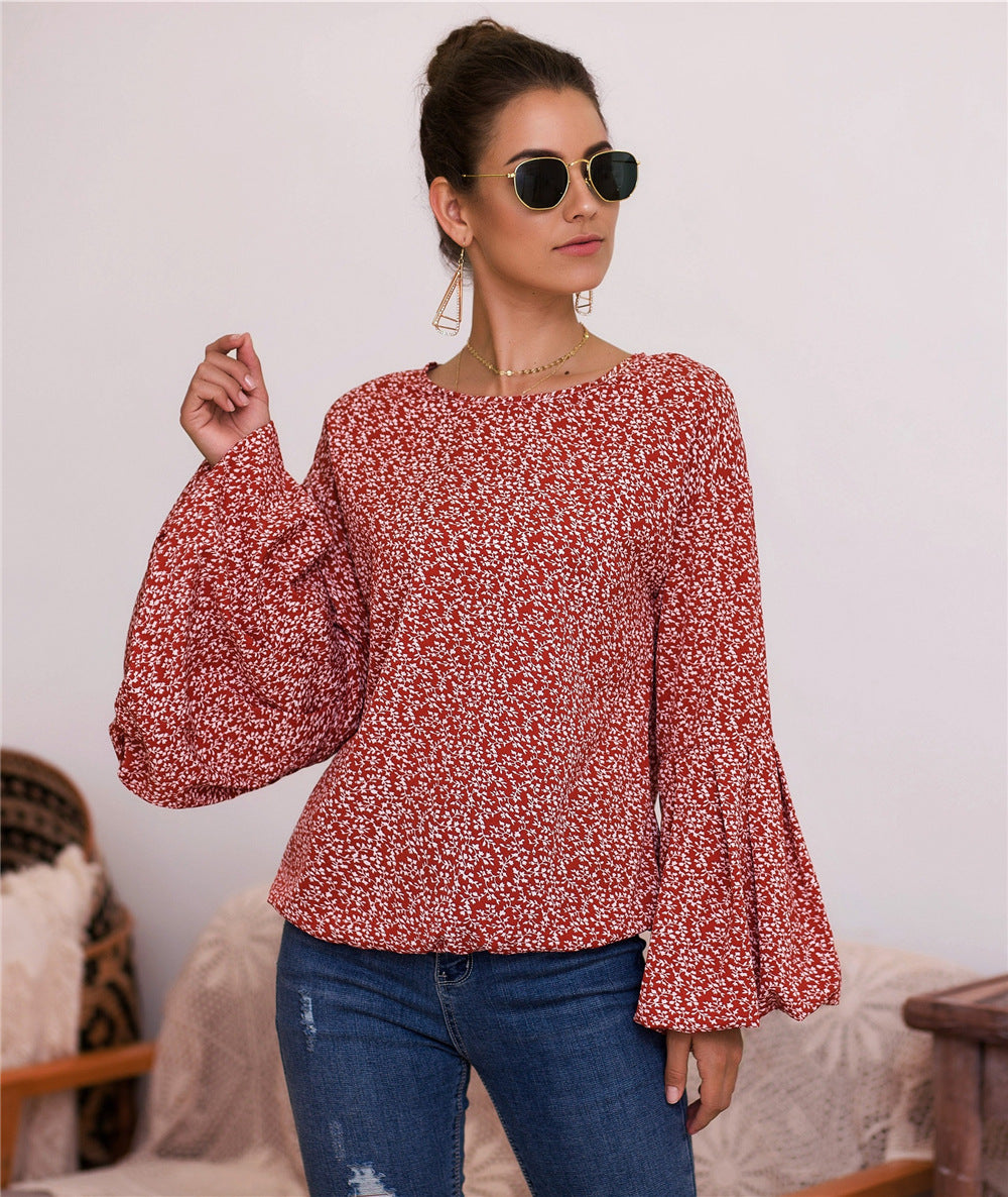 Damen Bluse mit voluminösen Ärmeln und floralen Details EB