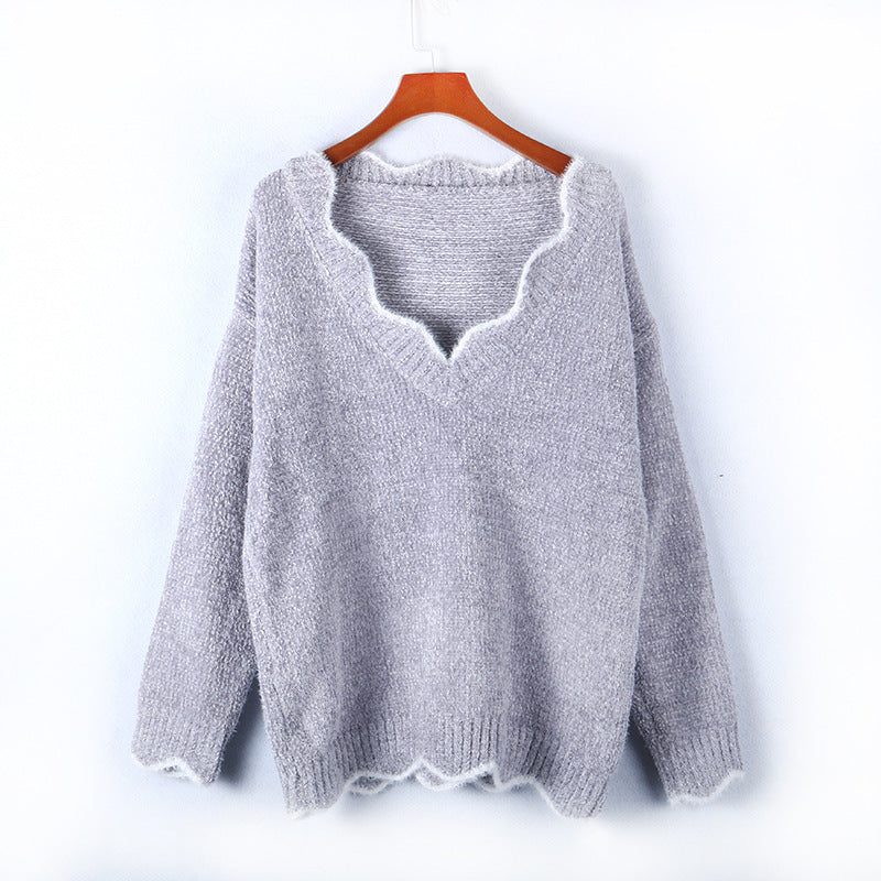 Damen kuscheliger Strickpullover mit tiefem V-Ausschnitt und gewellten Abschlüssen EB