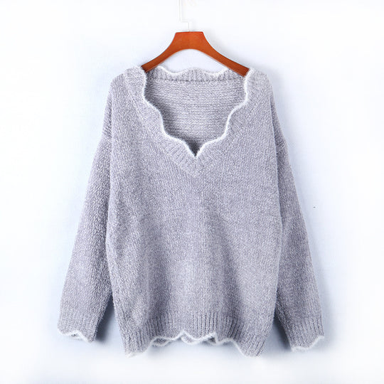 Damen kuscheliger Strickpullover mit tiefem V-Ausschnitt und gewellten Abschlüssen EB