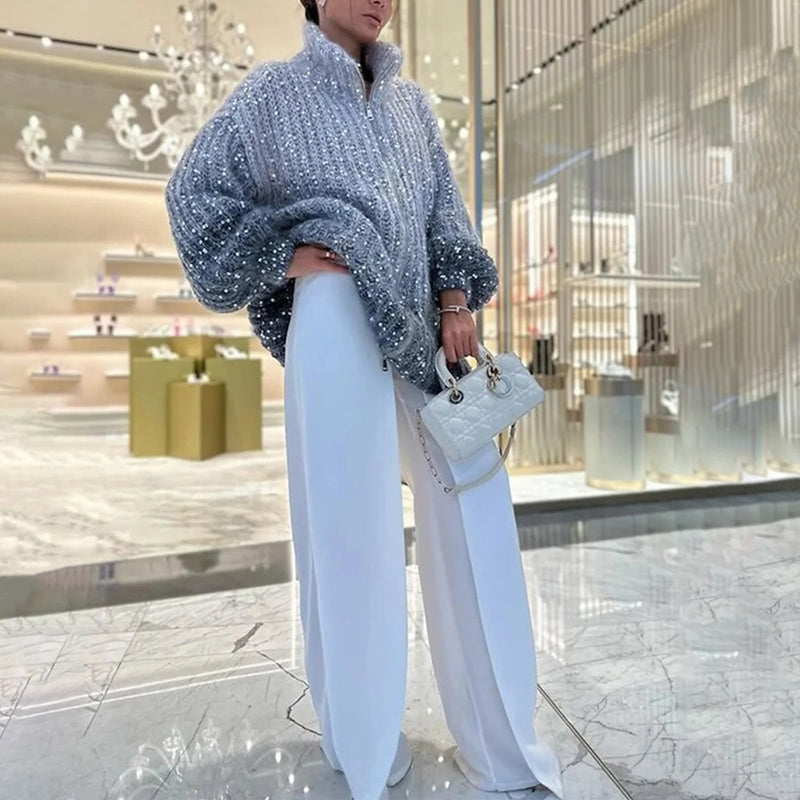 EB | Strickpullover mit Pailletten Ballonärmel Elegant und Handstrick-look