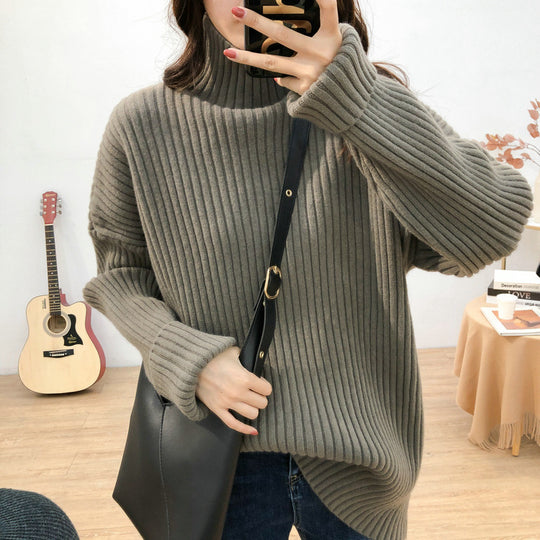 Damen Grobstrickpullover mit hohem Kragen und feiner Rippstruktur EB