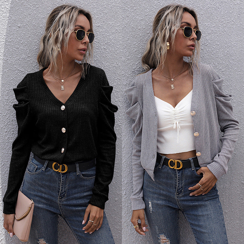 Damen Strickjacke mit dekorativen Knopfdetails und voluminösen Ärmeln EB
