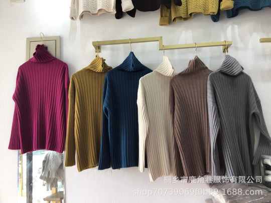 Damen Grobstrickpullover mit hohem Kragen und feiner Rippstruktur EB