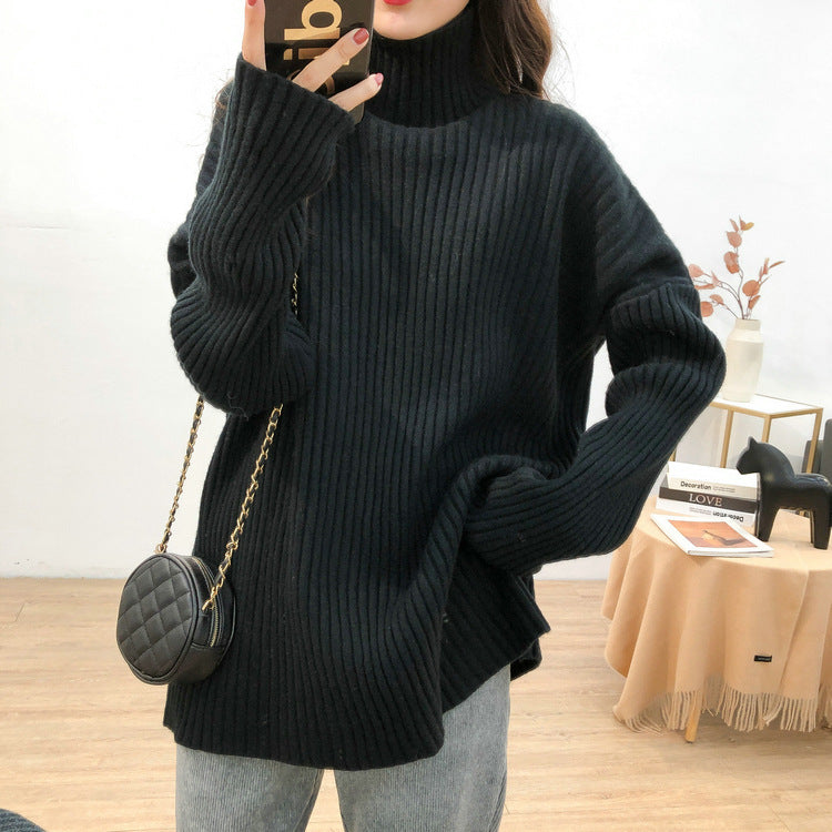 Damen Grobstrickpullover mit hohem Kragen und feiner Rippstruktur EB
