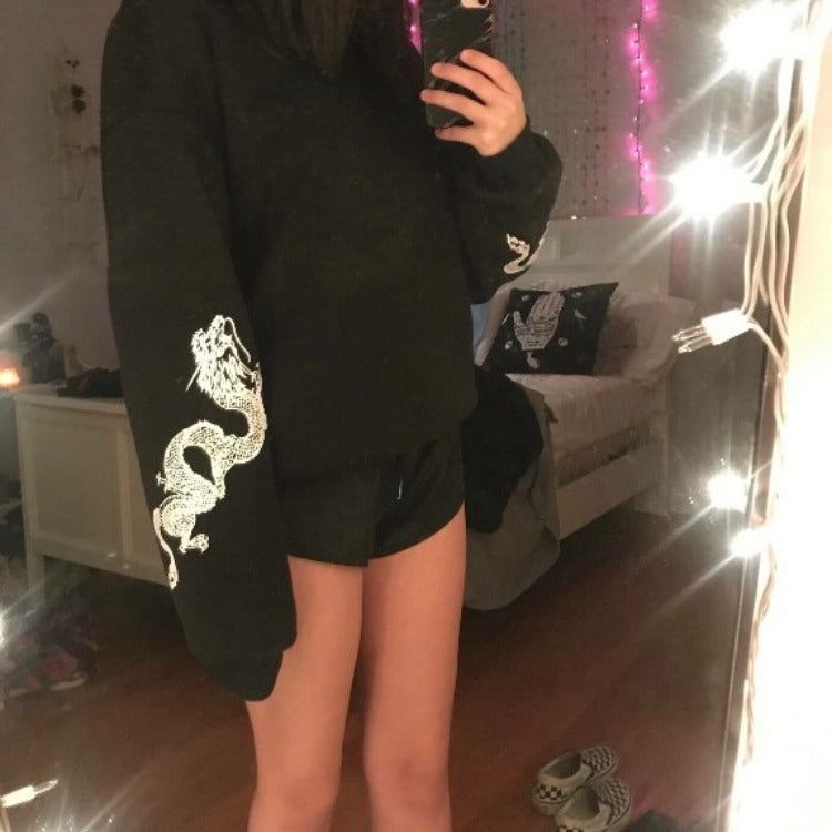 Damen Oversize Sweatshirt mit Drachenprint an Ärmeln und Rundhalsausschnitt EB