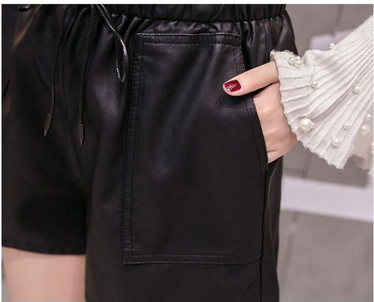 Damen Elegante Shorts mit weitem Gummibund und praktischen Taschen EB