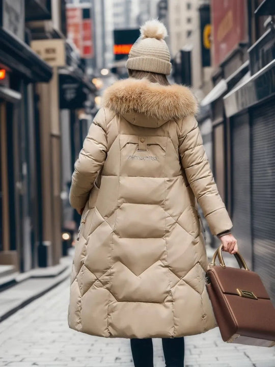 EB | Lange gesteppte Jacke mit Kapuze Isolde