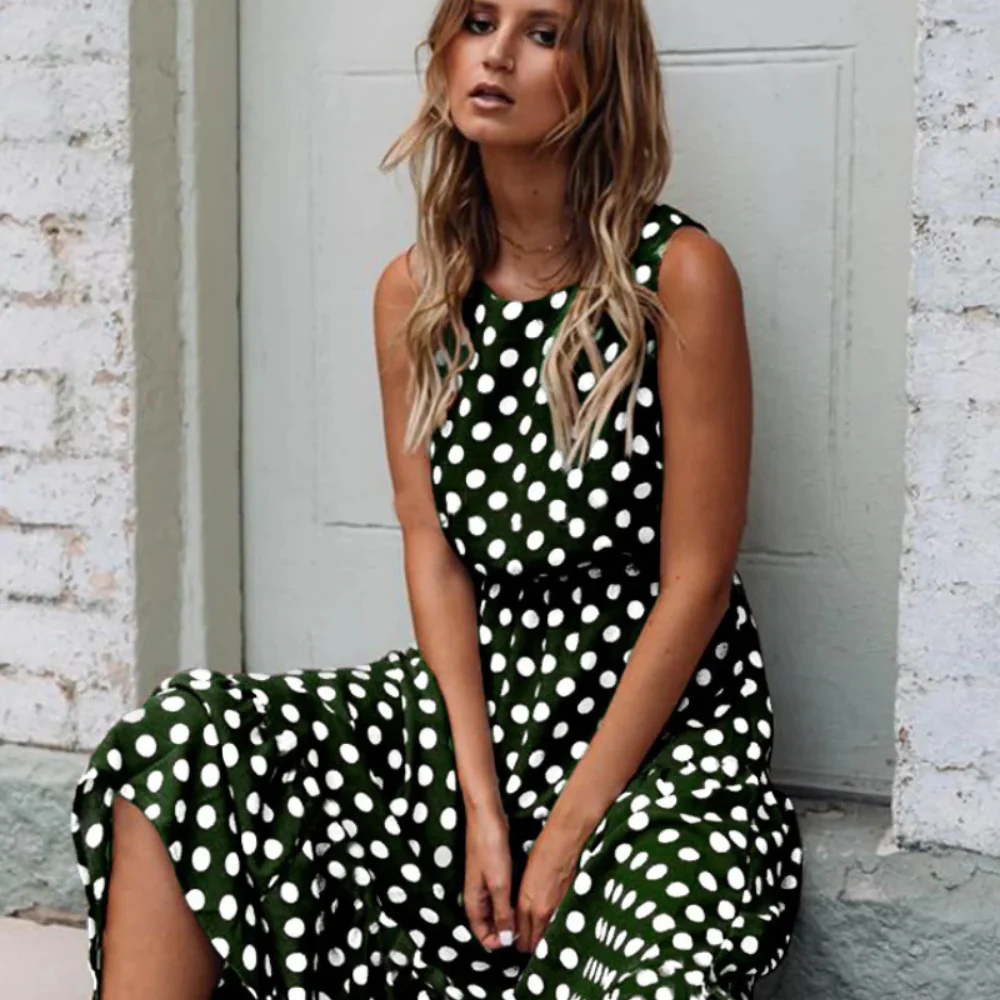 EB | Schwarzes Polka Dot Midikleid für Einen Retro Chic Look