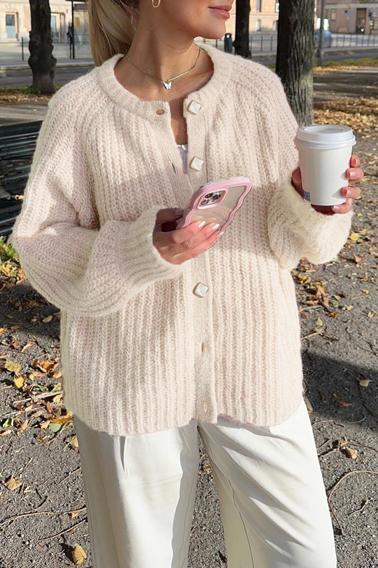 EB | Lässiger Strickpullover mit Knöpfen und Rundhalsausschnitt. Oberbekleidung