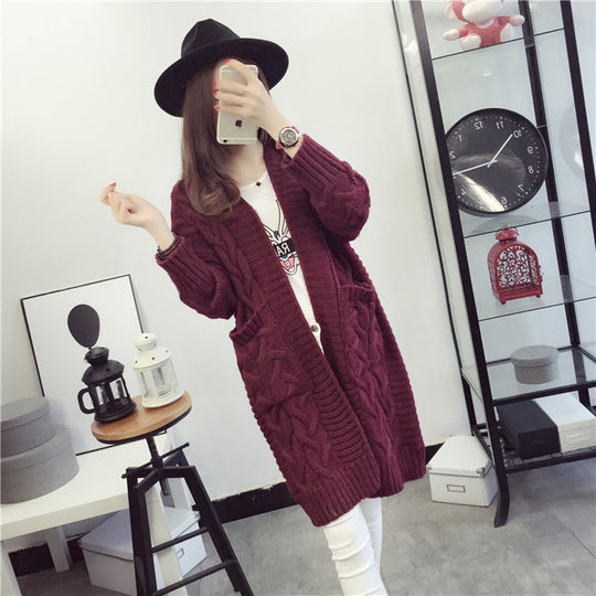 Damen Grobstrickjacke mit elegantem Zopfmuster und praktischen Taschen EB