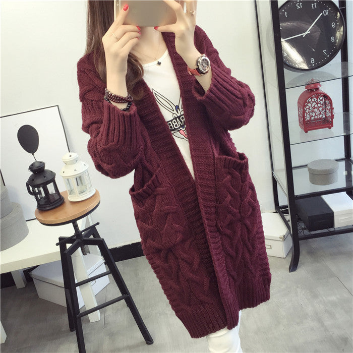 Damen Grobstrickjacke mit elegantem Zopfmuster und praktischen Taschen EB