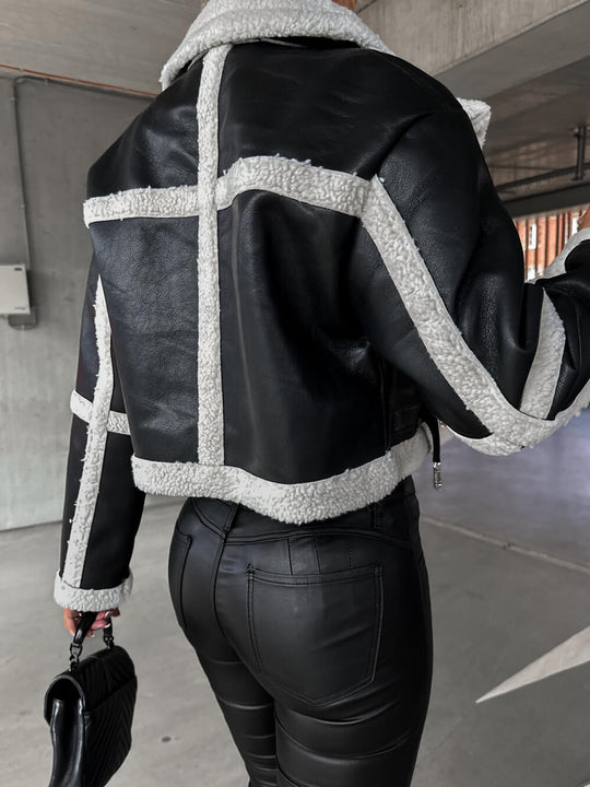 EB | Elegante Lederjacke mit Plüschbesatz