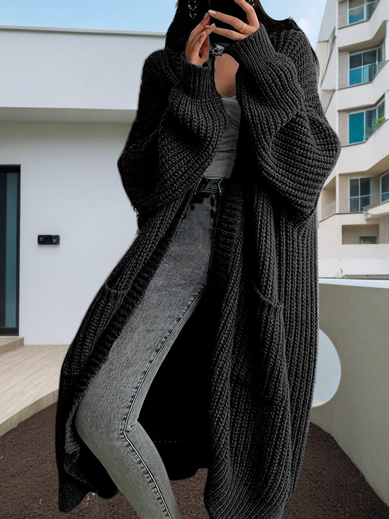 Damen Kuscheliger Strickmantel mit Gürtel und praktischen Taschen EB