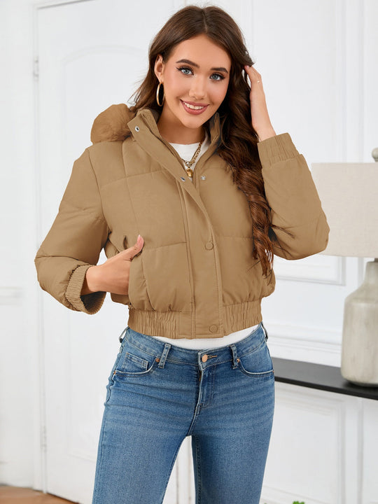 EB | Wattierte Winterjacke mit Pelzkapuze und Taschen