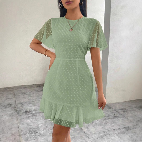 EB | Dreidimensionales Kleid mit Rüschenrand und Punkten
