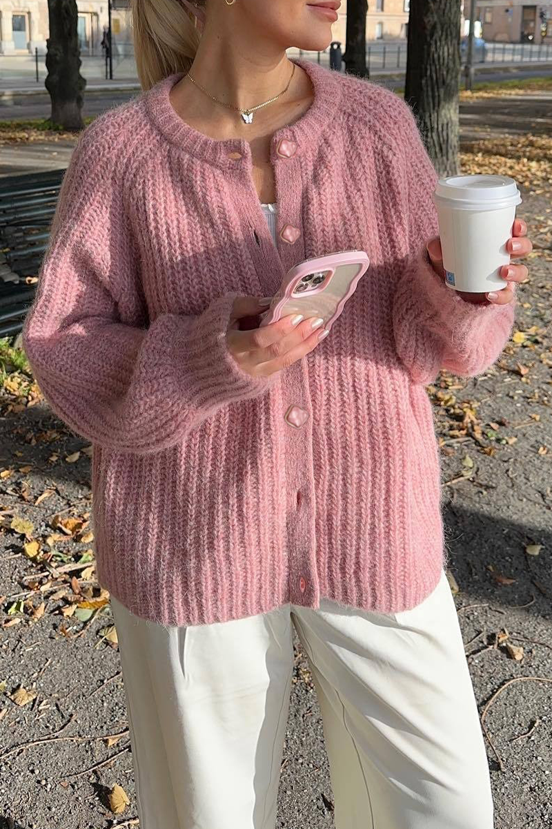EB | Lässiger Strickpullover mit Knöpfen und Rundhalsausschnitt. Oberbekleidung