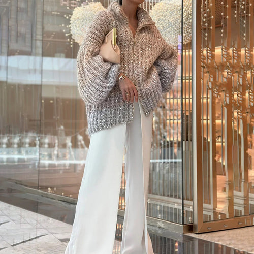 EB | Strickpullover mit Pailletten Ballonärmel Elegant und Handstrick-look