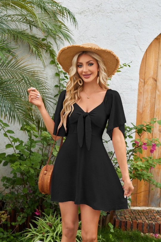 EB | Kleid mit V-Ausschnitt und Schleife zum Schnüren