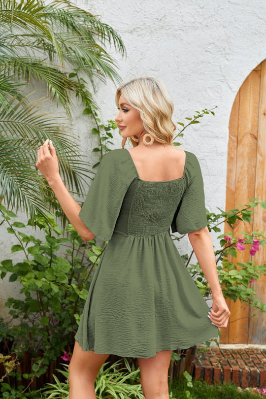EB | Kleid mit V-Ausschnitt und Schleife zum Schnüren