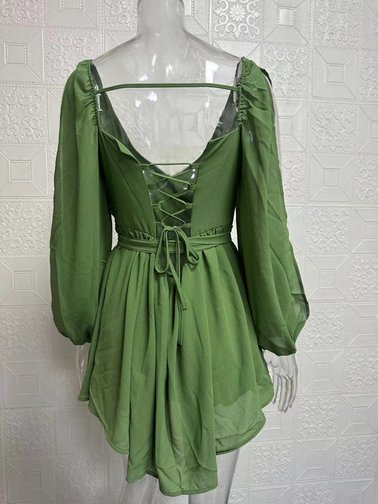 EB | Langärmeliges Neckholder-Kleid aus Mesh