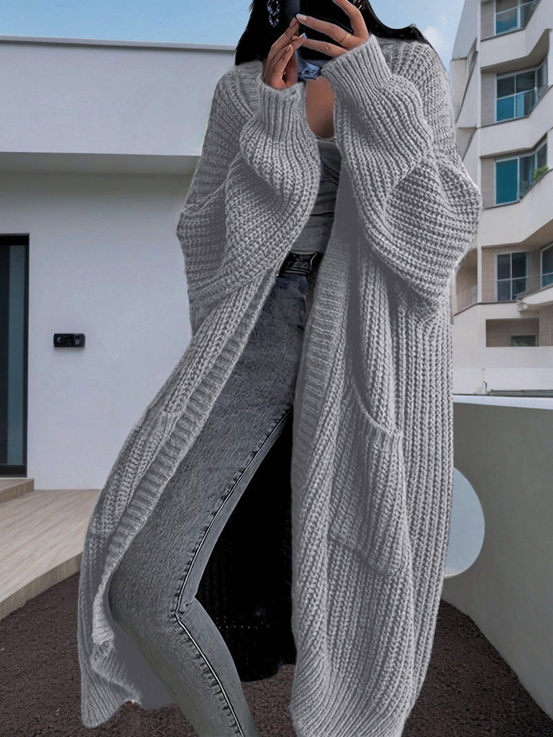 Damen Kuscheliger Strickmantel mit Gürtel und praktischen Taschen EB