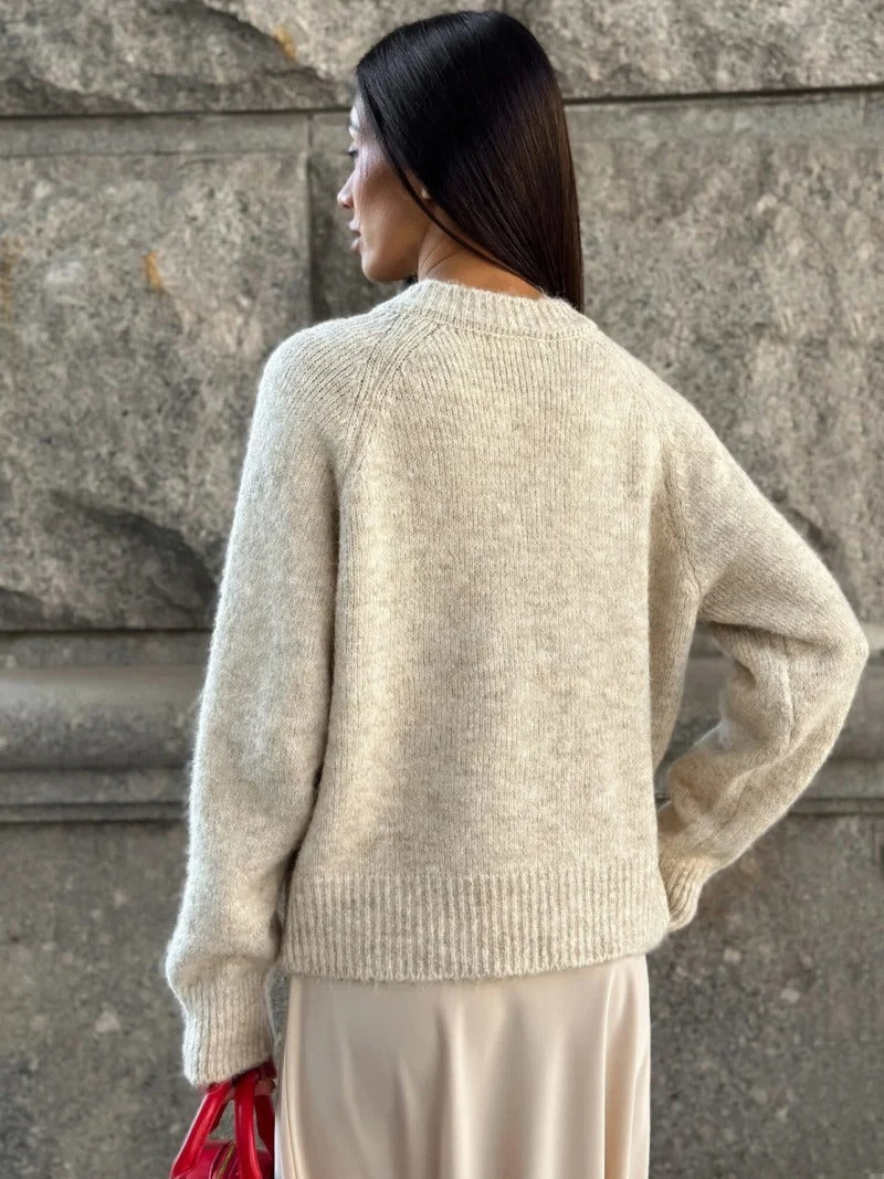 EB | Kuschelige Strickjacke mit Herzknöpfen