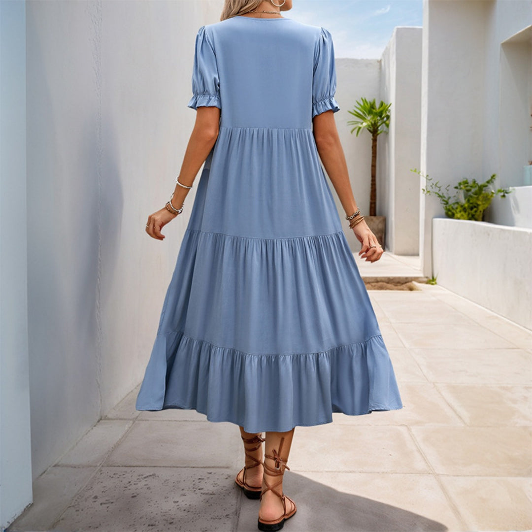 EB | Ein pendelfarbenes Kleid mit Stehkragen