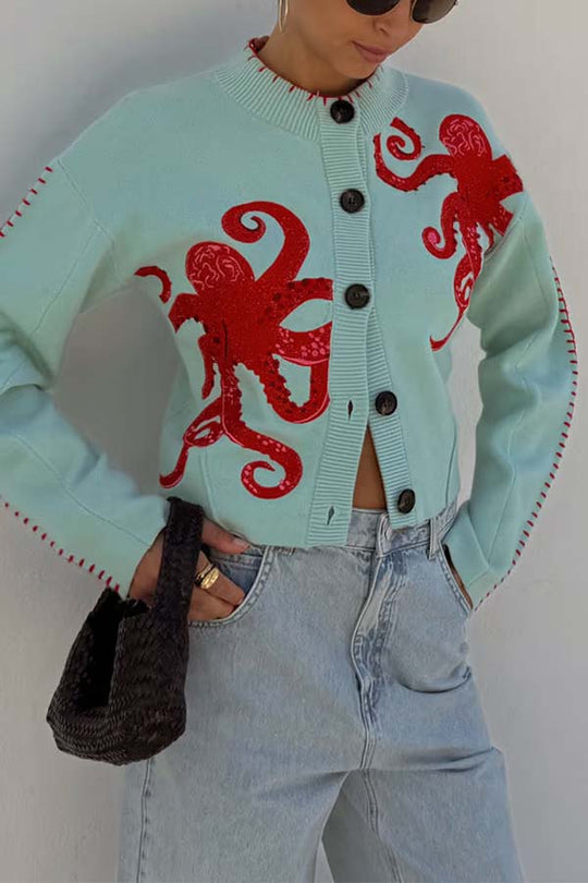EB | Küstenstrickjacke mit Oktopus-Motiv und Kontrastpaspelierung