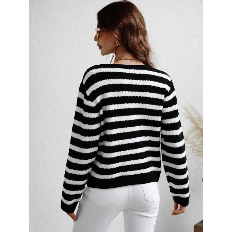 EB | grob gestrickter Pullover mit Knopfleiste und seitlichen Taschen