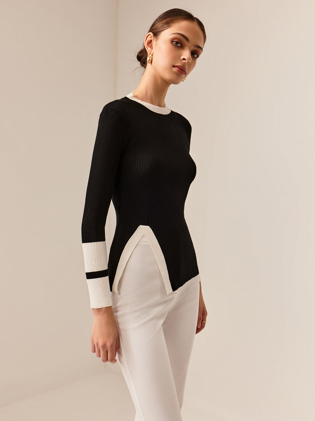 EB | Rippstrickbluse Kontrastelemente Modern und Elegant