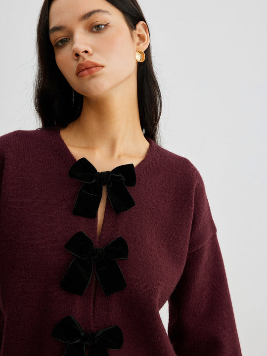 EB | Strickcardigan mit Samtschleifen Wollmischung Feminin und Modern